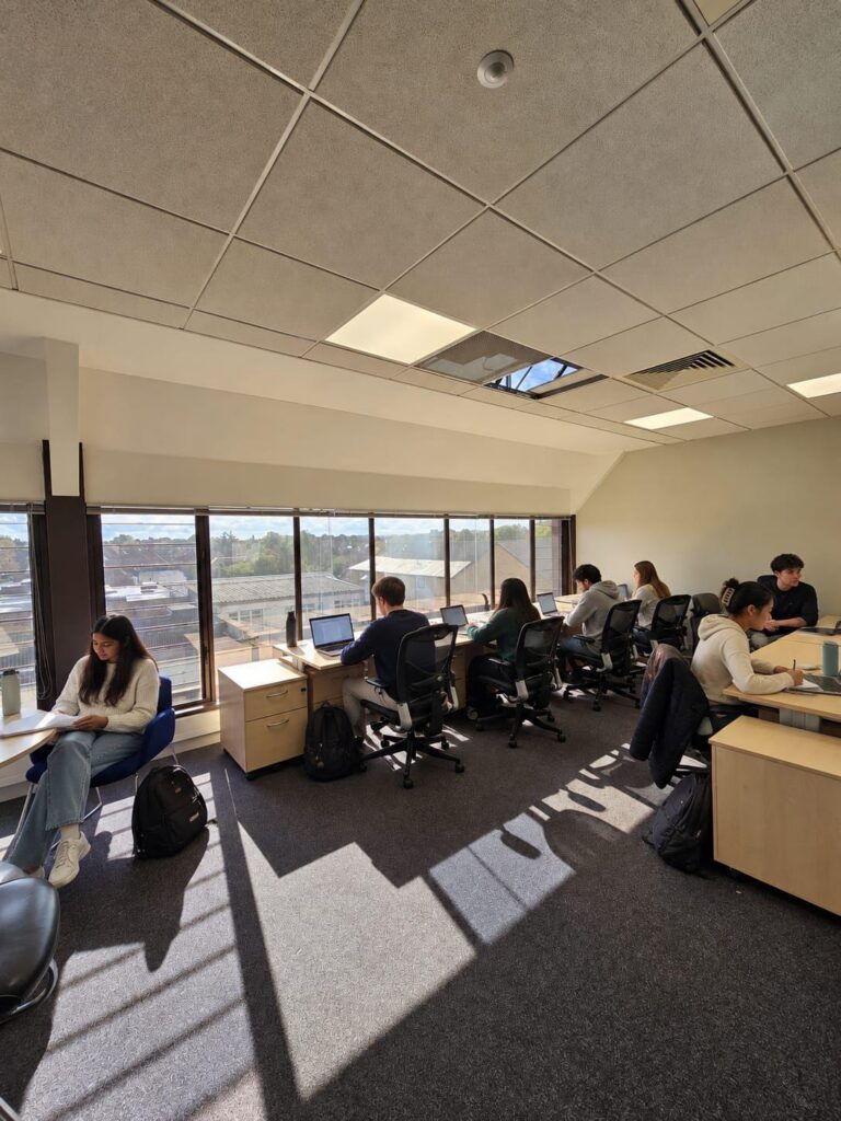 Students studying in the top-floor study room overlooking Oxford
